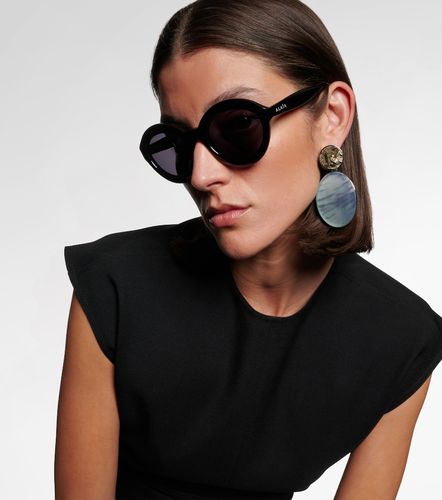 Alaïa Lunettes de soleil rondes Lettering Logo - Alaia - Modalova