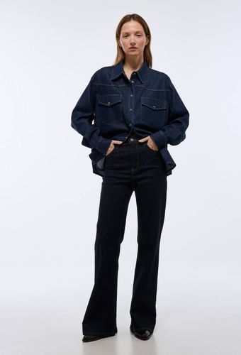 Jean boot cut contenant du coton - MONOPRIX - Modalova