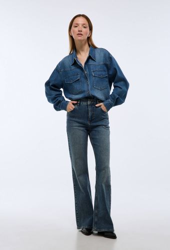 Jean boot cut contenant du coton - MONOPRIX - Modalova