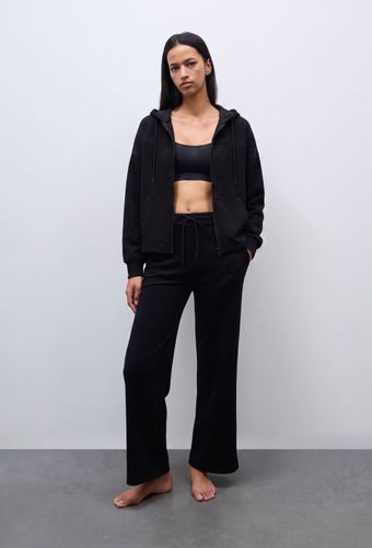 Pantalon de uni en molleton technique - SPORT - Modalova