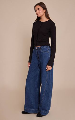 Jean Large Bleu Moyen Décontracté Taille Mi-haute Avec Détails De Coutures | Taille 32 - PrettyLittleThing - Modalova