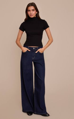 Jean Large Taille Mi-haute En Denim Stretch | Taille 42 - PrettyLittleThing - Modalova