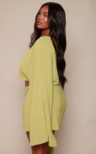 Haut Coordonné Grande Taille Olive En Tissu Fluide Avec Encolure Bateau Et Manches Longues | Taille 54 - PrettyLittleThing - Modalova