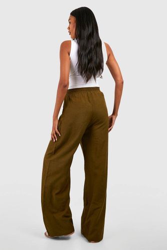 Pantalon de maternité en imitation lin avec cordon de serrage et jambes larges | Taille 42 - boohoo - Modalova