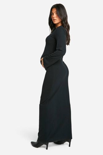Robe maxi de maternité à col rond, tissu côtelé, coupe colonne et manches évasées | Taille 46 - boohoo - Modalova