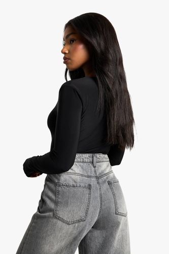 Body à double couche Slinky à décolleté plongeant à l'avant et manches longues | Taille 44 - boohoo - Modalova