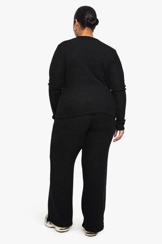 Ensemble cardigan à côtes douces grande taille et pantalon à taille élastiquée | Taille 48 - boohoo - Modalova