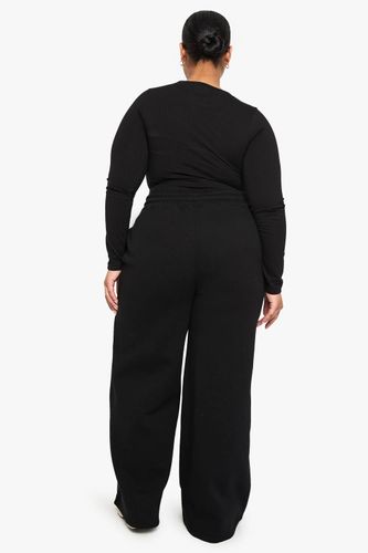 JOGGERS PLUS-SIZE À JAMBES LARGES | Taille 48 - boohoo - Modalova