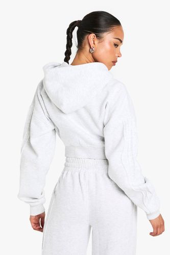 Sweat à capuche court à la coupe boxy avec zip intégral et détails de couture | Taille Medium - boohoo - Modalova