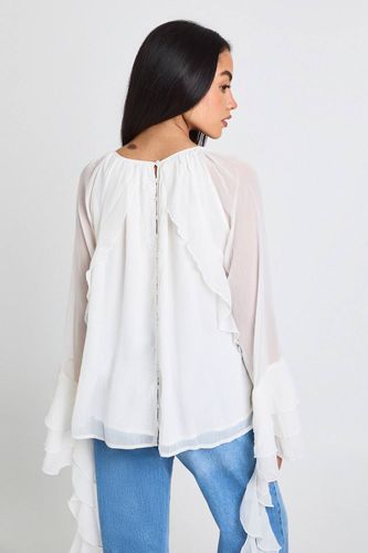Chiffon à volants et boutons dans le dos – Chemisier | Taille 40 - boohoo - Modalova