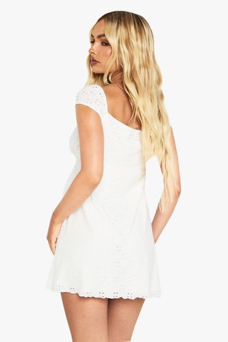 Robe smock en broderie anglaise à manches cap | Taille 44 - boohoo - Modalova