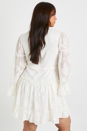 Plus Robe chemisier en chiffon floral | Taille 48 - boohoo - Modalova