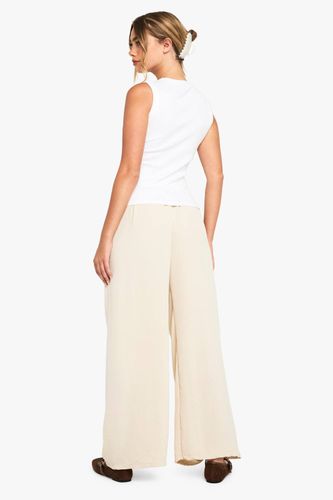 Pantalon tissé à nouer à la taille, coupe évasée | Taille XS/Small - boohoo - Modalova