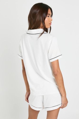 Ensemble pyjama chemise à manches courtes avec détail de passepoil en jersey et short | Taille 44 - boohoo - Modalova
