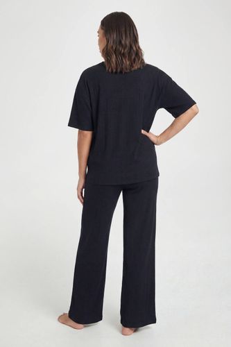 Ensemble coordonné de t-shirt de maternité et pantalon à jambes larges | Taille 44 - boohoo - Modalova