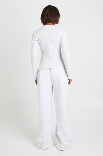 Survêtement à manches longues à côtes hautes et à boutons traversants | Taille Medium - boohoo - Modalova