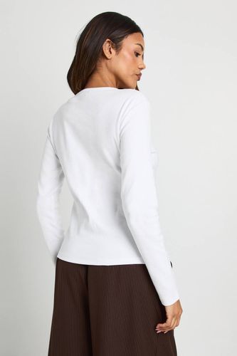 Haut de maternité basique côtelé, manches longues, coupe longiligne et ajusté | Taille 44 - boohoo - Modalova