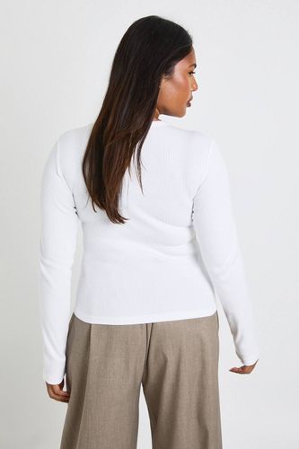 Haut longline ajusté à manches longues en maille côtelée Plus Basic | Taille 48 - boohoo - Modalova