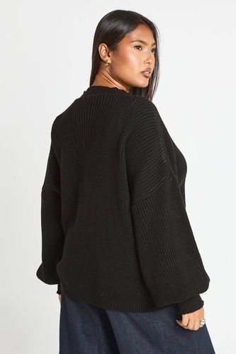 Cardigan en maille côtelée à manches ballon et bouton traversant Plus | Taille 24-26 - boohoo - Modalova