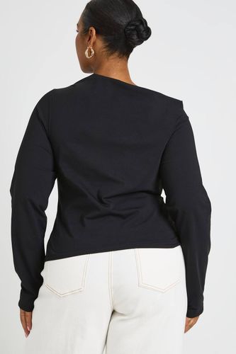 Haut Grande Taille À Manches Longues Avec Nœud Noué | Taille 48 - boohoo - Modalova
