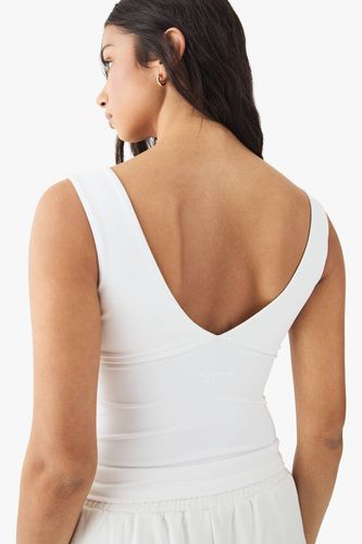 Haut de Sport Sans Manches Sculptant à Devant Croisé Ultra Sculpt | Taille Medium - DSGN Studio - Modalova