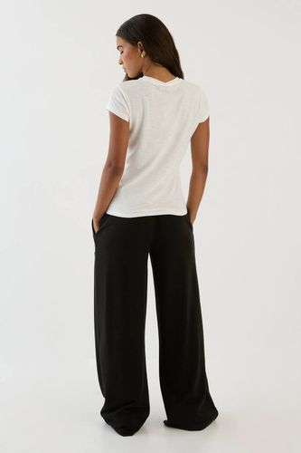 Jogging Coupe Large Taille Basse Avec Molleton Bouclette | Taille Medium - DSGN Studio - Modalova