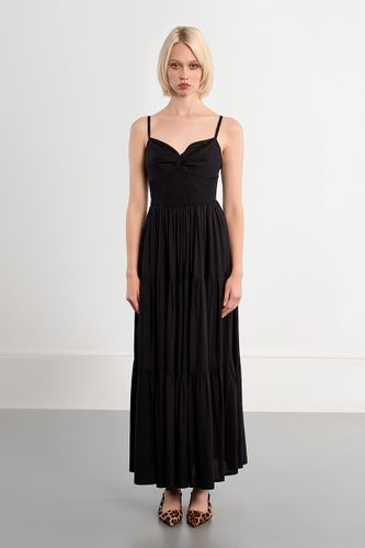 Robe maxi smockée à volants - LILI SIDONIO - Modalova