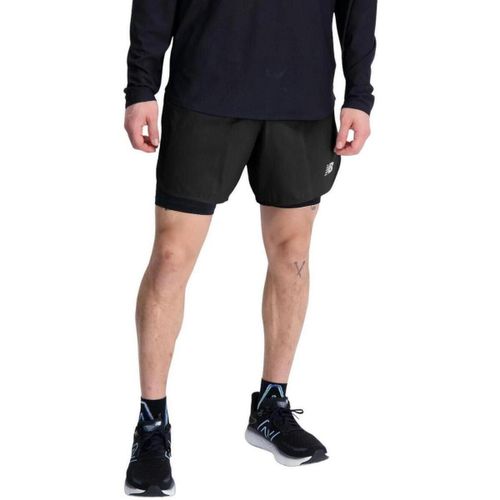 Pantalon New Balance MS33282-BK - New Balance - Modalova