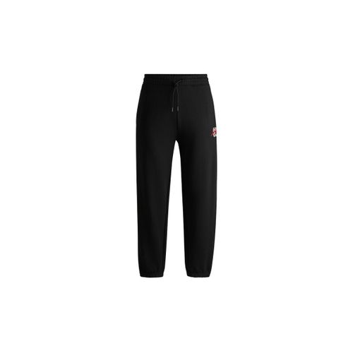 Pantalon BAS DE SURVÊTEMENT NOIR EN MOLLETON DE COTON À DOUBLE LOGO H - HUGO - Modalova