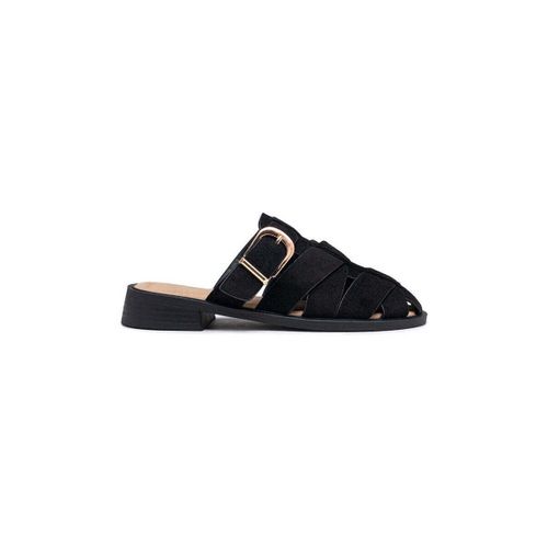 Mules Mules plates avec brides croisées et boucle dorée, noire - Vera Collection - Modalova