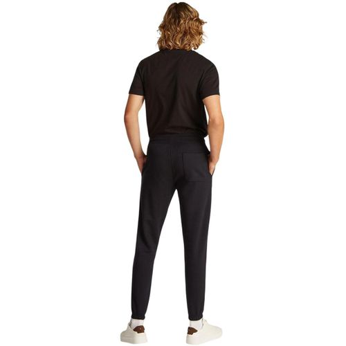 Pantalon TJM SLIM S FLAG SWEA DM0DM20473 - Tommy Hilfiger - Modalova