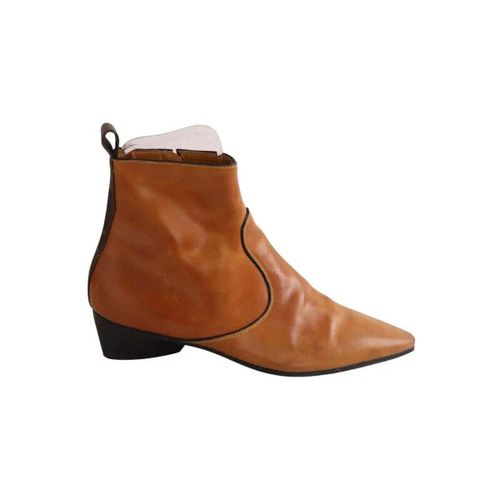 Bottines Louis Vuitton Boots camel - Louis Vuitton - Modalova
