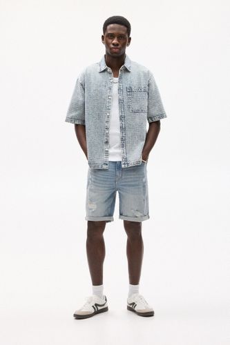 Bermuda En Jean Slim Déchirures - Pull&Bear - Modalova