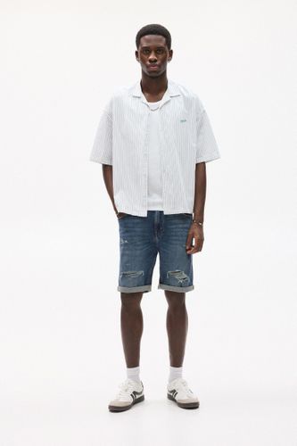 Bermuda En Jean Slim Déchirures - Pull&Bear - Modalova