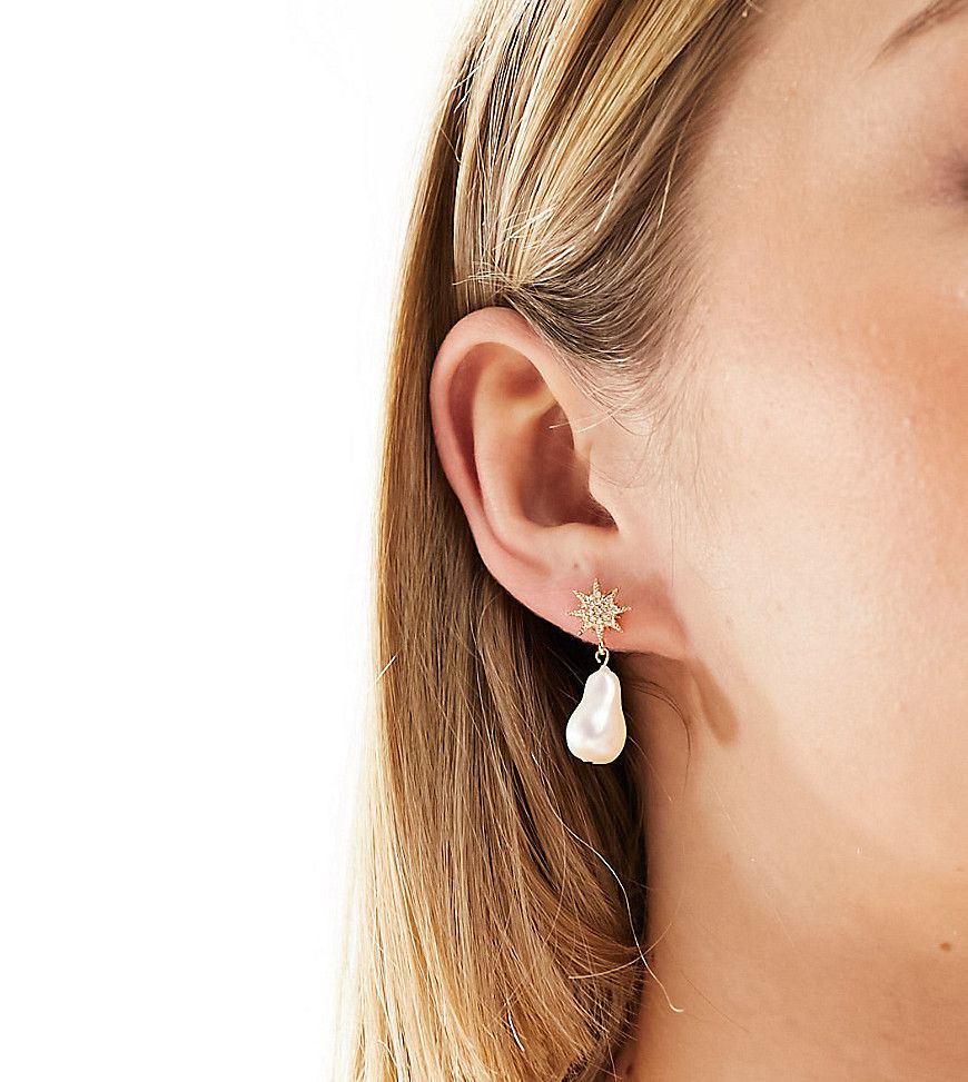Boucles d'oreilles en plaqué or avec étoile et perle - Orelia - Modalova