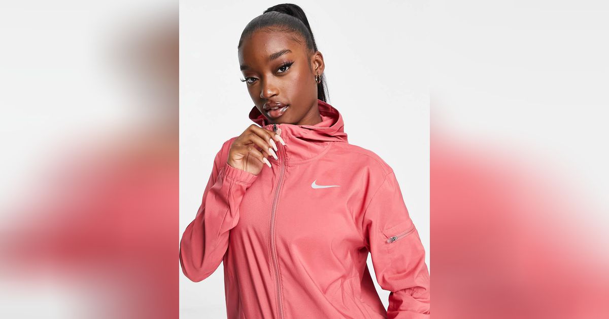 veste nike rose et blanche